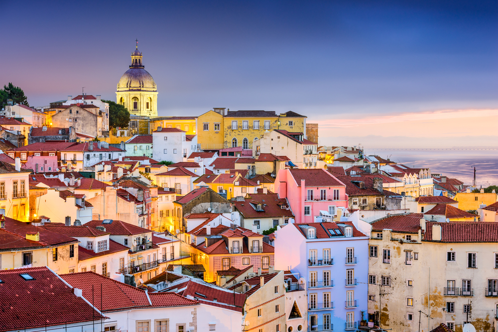 Lisbon, Portugal twilight cityscape at the Alfama District.